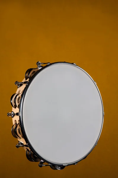 Tambourine Isolated on Gold — Stock Photo, Image
