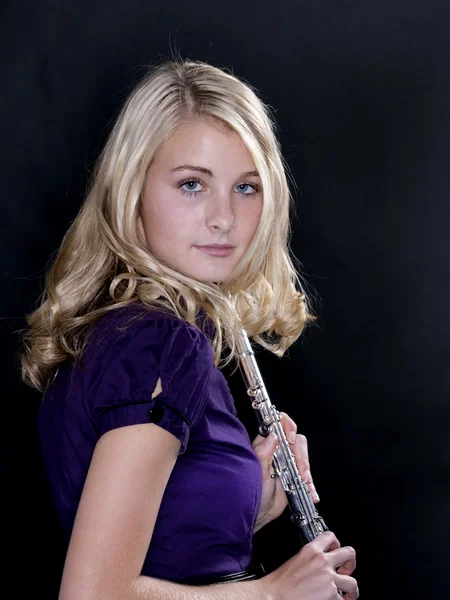 Teenage Flute Player On Black — Stock Photo, Image
