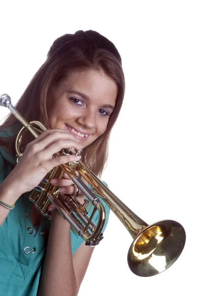 Adolescente chica sosteniendo trompeta aislado en blanco — Foto de Stock