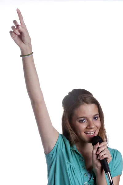 Adolescente chica cantando en blanco — Foto de Stock