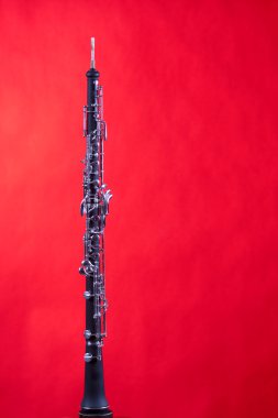 Oboe Isolated On Red clipart