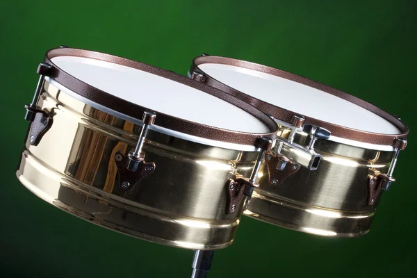 Set of Brass Timbales Isolated on Green — Stock Photo, Image