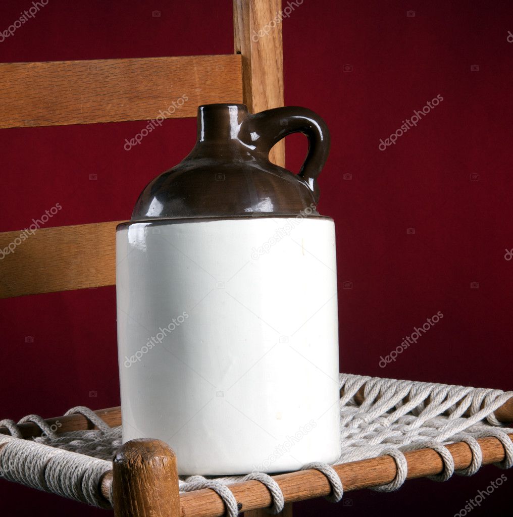 Old Pottery Jug on Rope Chair
