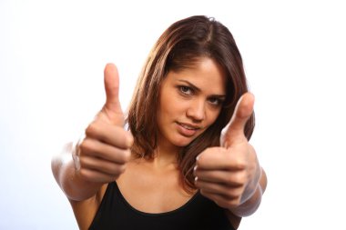 Happy woman gives both thumbs up clipart