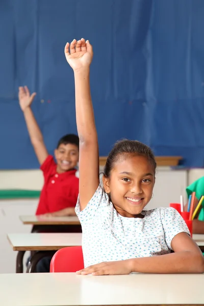 stock image Two school children arms raised