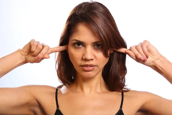 Woman fingers in ears not listening — Stock Photo, Image