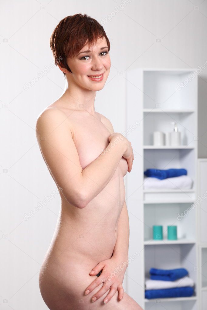 Young woman in bathroom