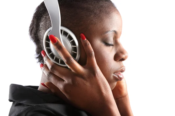 Frau verliert sich in Musik — Stockfoto