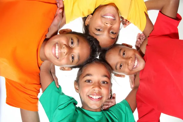 Happy young school friends boys and girls together in huddle — Stock Photo, Image