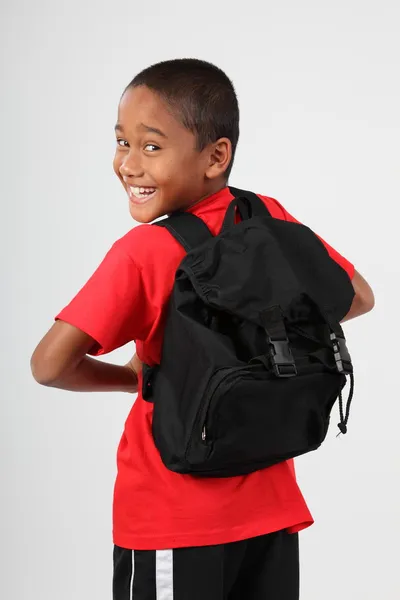 Veselá škola chlapec s batoh — Stock fotografie