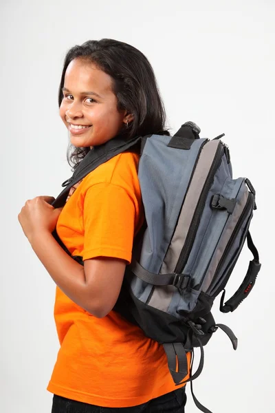 School girl looking over shoulder off to school — Stock Photo, Image