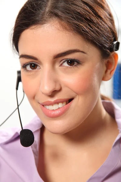Telephone operator smiling — Stock Photo, Image