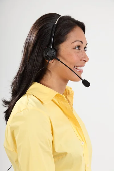 Profil för glad receptionist på telefon — Stockfoto
