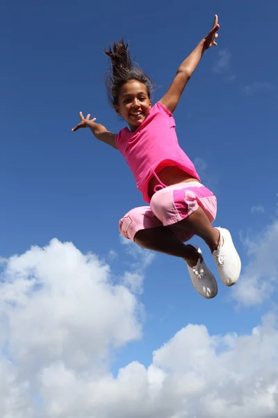 Happy leap of joy great success for young girl — Stock Photo, Image