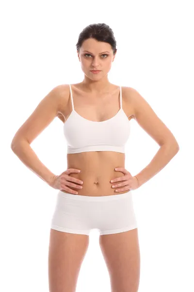 Mulher ajuste bonito em sutiã esportes brancos e cuecas — Fotografia de Stock