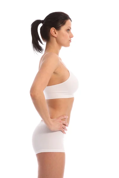 Vista laterale sexy donna sportiva in biancheria intima bianca — Foto Stock