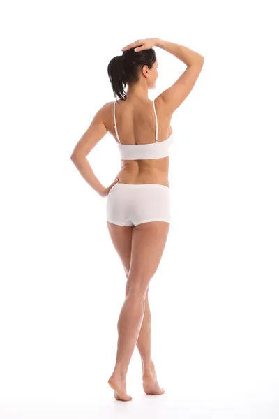 Costas de mulher bonita com corpo de ajuste tonificado — Fotografia de Stock