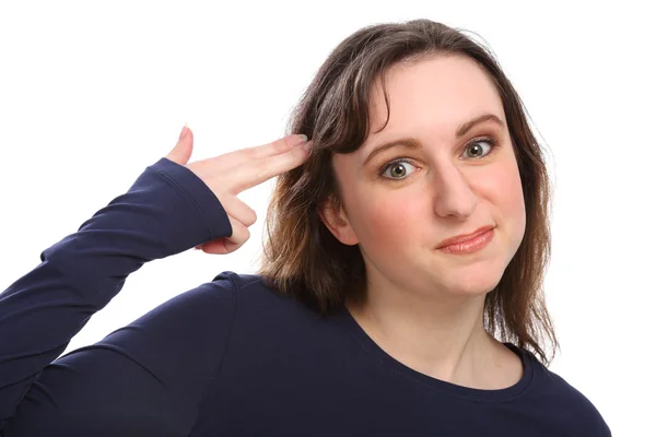 Young woman makes pretend gun to head gesture — Stock Photo, Image