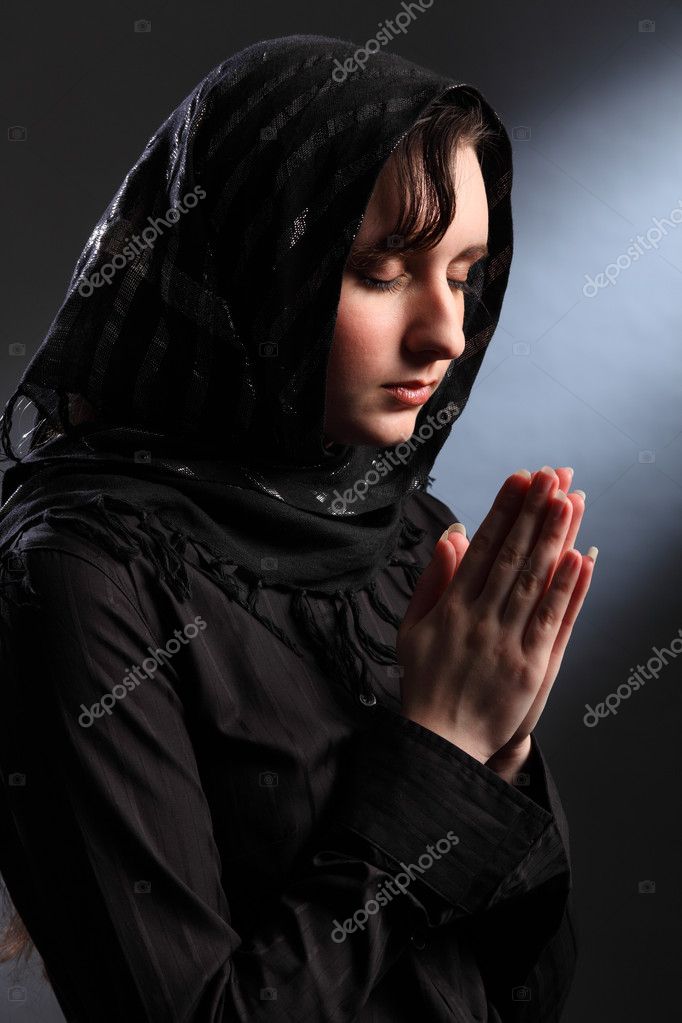 Religious woman meditating in spiritual worship — Stock Photo