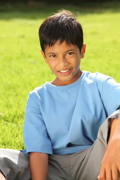 Boy in beautiful bright sunshine — Stock Photo, Image
