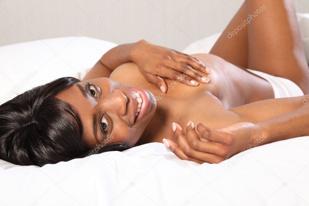 Topless in bedroom beautiful happy black woman