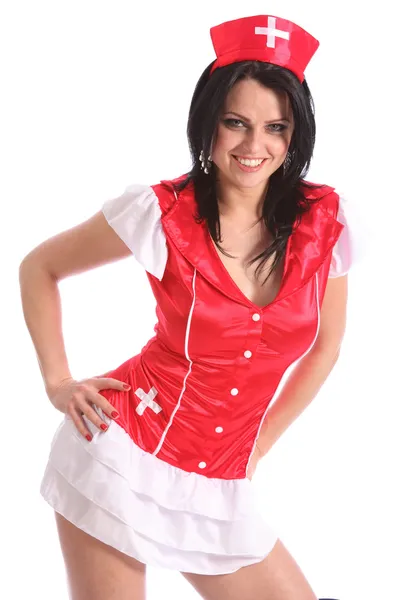 stock image Sexy young woman in red fancy dress nurse costume