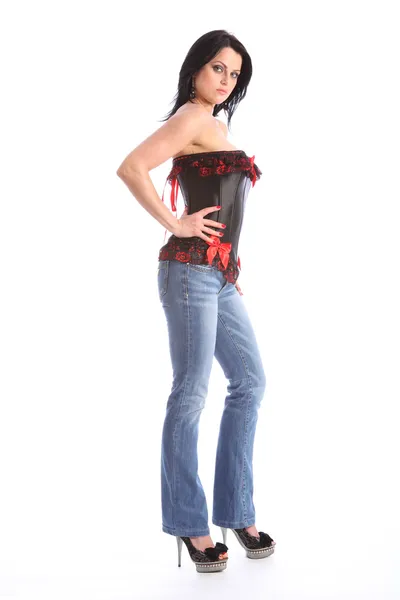 Beautiful tall model in jeans and sexy corset — Stok fotoğraf