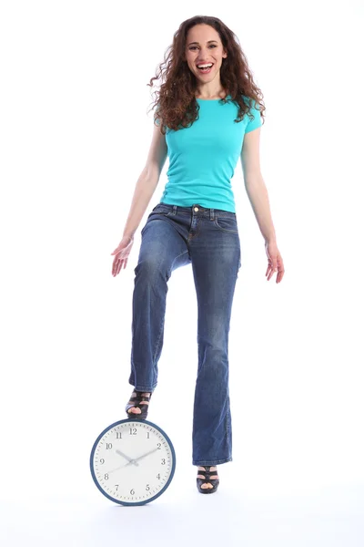 Happy laughing young woman standing on time clock — Stock Photo, Image