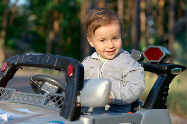 stock image Baby at the toy car