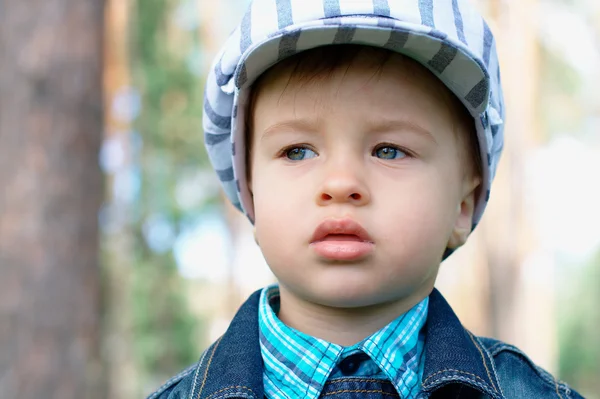 Serious baby at the park — Stock Photo, Image
