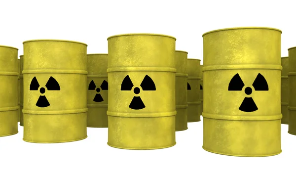 Reihenweise gelbe Atommüllfässer — Stockfoto