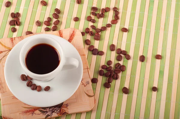 Tasse à café et grains de café — Photo