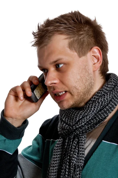 Młody człowiek rozmawia przez telefon. — Zdjęcie stockowe