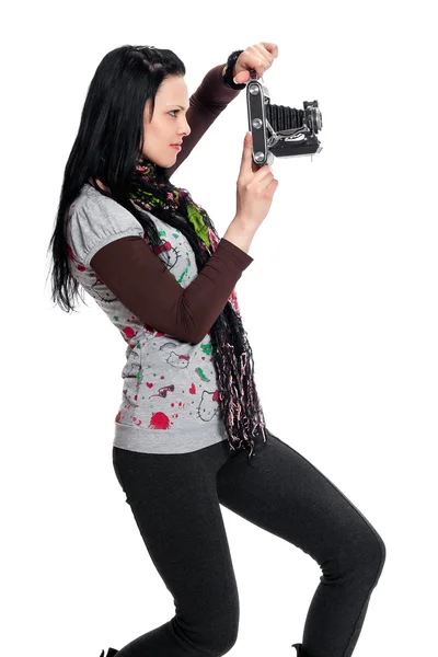 Brunetka z antykami kamery — Zdjęcie stockowe