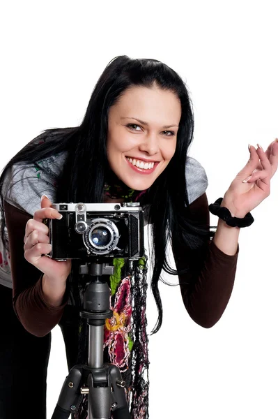 Morena com uma câmera antiga — Fotografia de Stock