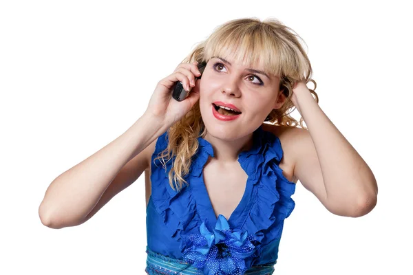 Meisje in blauwe jurk met een telefoon — Stockfoto