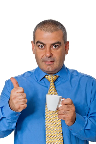 Homem de camisa azul bebendo café — Fotografia de Stock