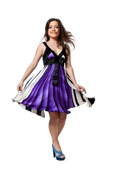 Dançando em vestido violeta — Fotografia de Stock