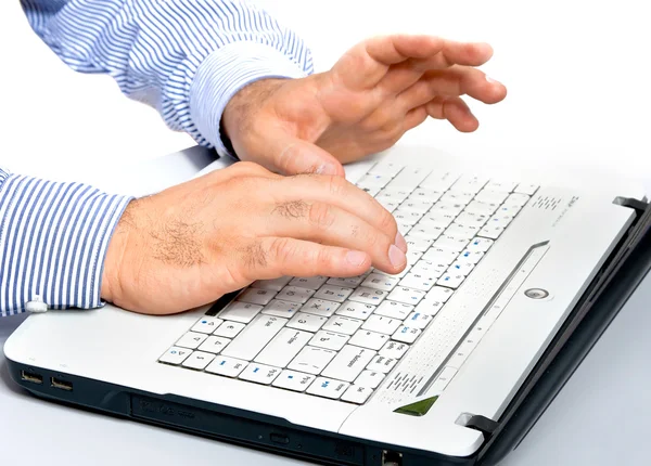 Men's hands on laptop keyboard large — Stock Photo, Image