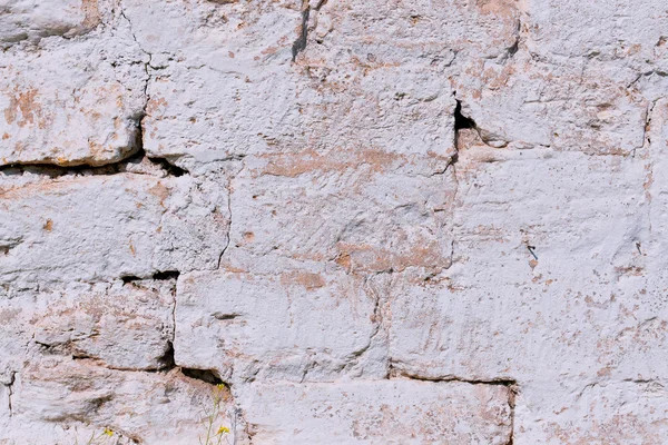 Mur en maçonnerie de pierre fait de grandes pierres arrondies — Photo