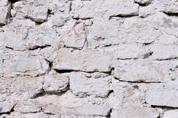 Muro in muratura di pietra realizzato con grandi pietre arrotondate — Foto Stock