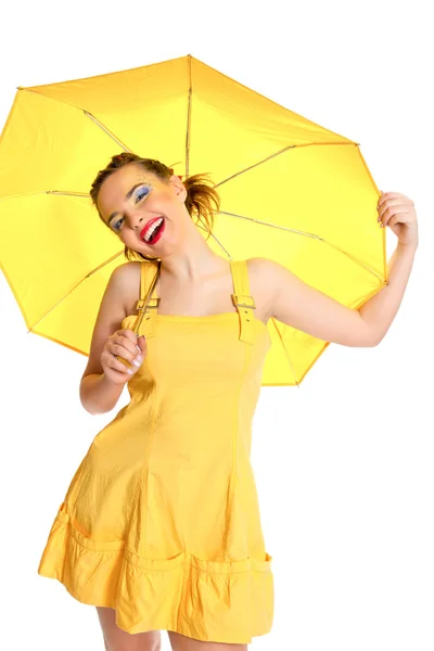 Дівчина в жовтій і жовтій парасольки — стокове фото