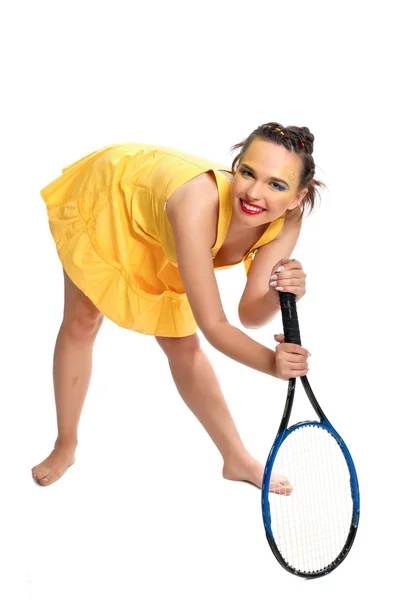 Chica en amarillo con raqueta de tenis —  Fotos de Stock