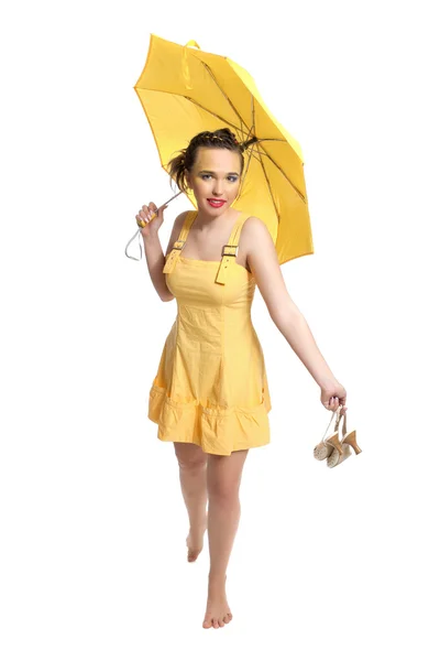Girl in yellow and yellow umbrella — Stock Photo, Image
