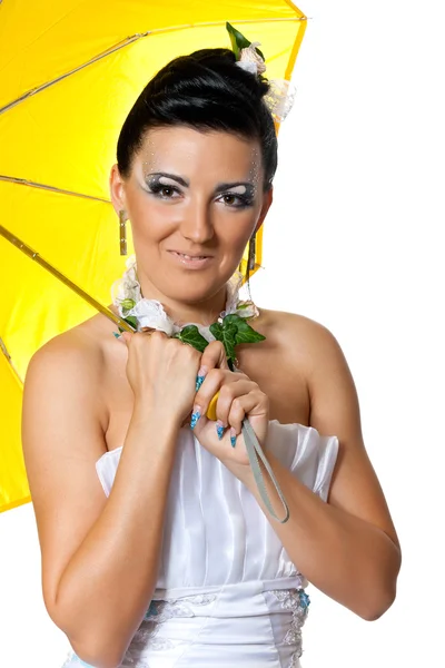 Bride with a yellow umbrella — Stock Photo, Image