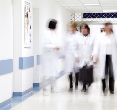 Hospital corridor blurred doctors clipart