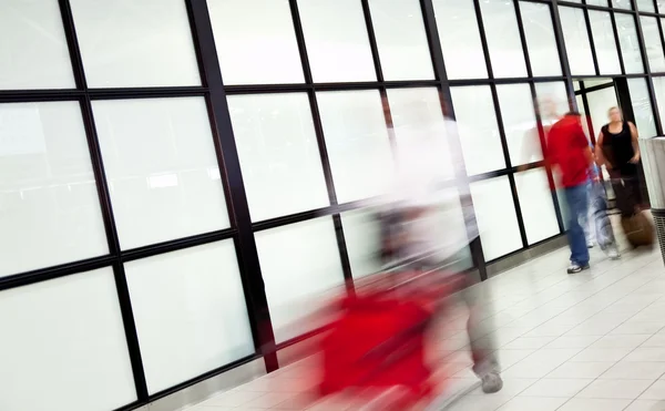 Blurred passingers airport — Stock Photo, Image
