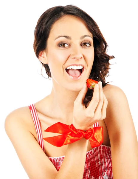 Woman eating berry — Stock Photo, Image