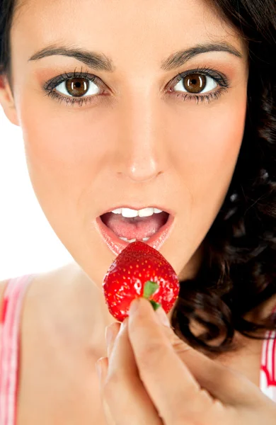 stock image Woman eating strawberry