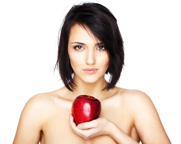 Schöne Frau mit einem Apfel in der Hand — Stockfoto